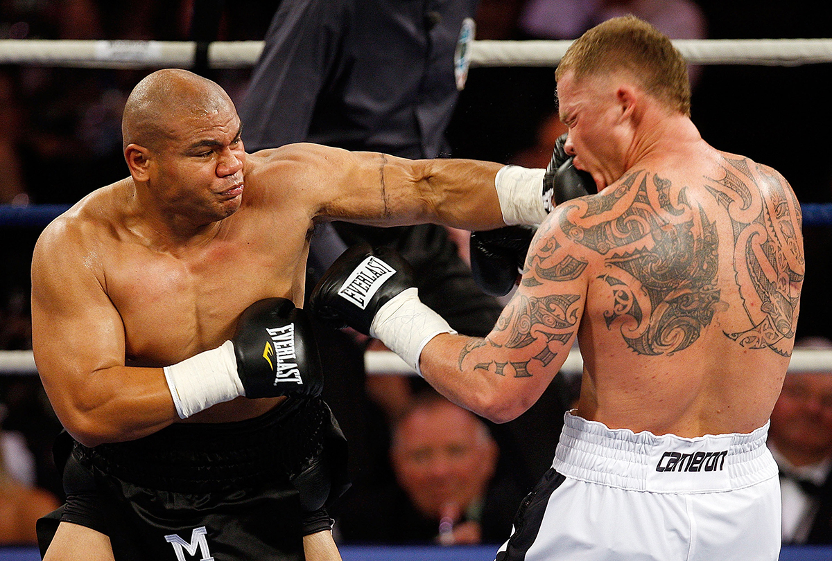 David Tua knocks Shane Cameron back into the ropes during their heavyweight fight at Mystery Creek on October 3 2009 in Hamilton