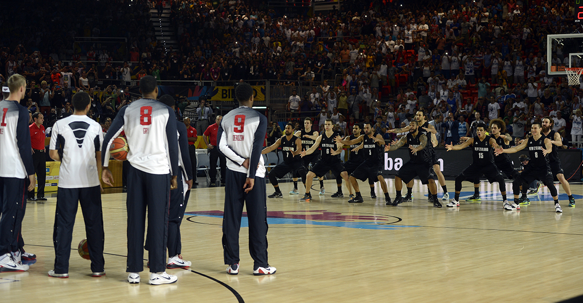 US basketball team players watch as New Zealand basketball team players perform the a haka prior to their 2014 FIBA Basketball World Cup Group C match at the Bizkaia Arena in Bilbao Spain