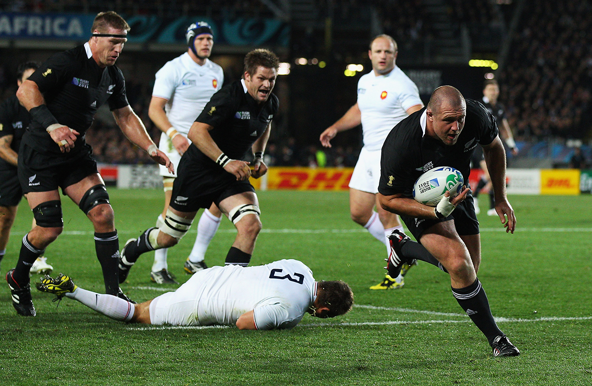 Tony Woodcock of the All Blacks breaks clear on the way to scoring his try during the 2011 IRB Rugby World Cup Final match between France and New Zealand at Eden Park on October 23 2011