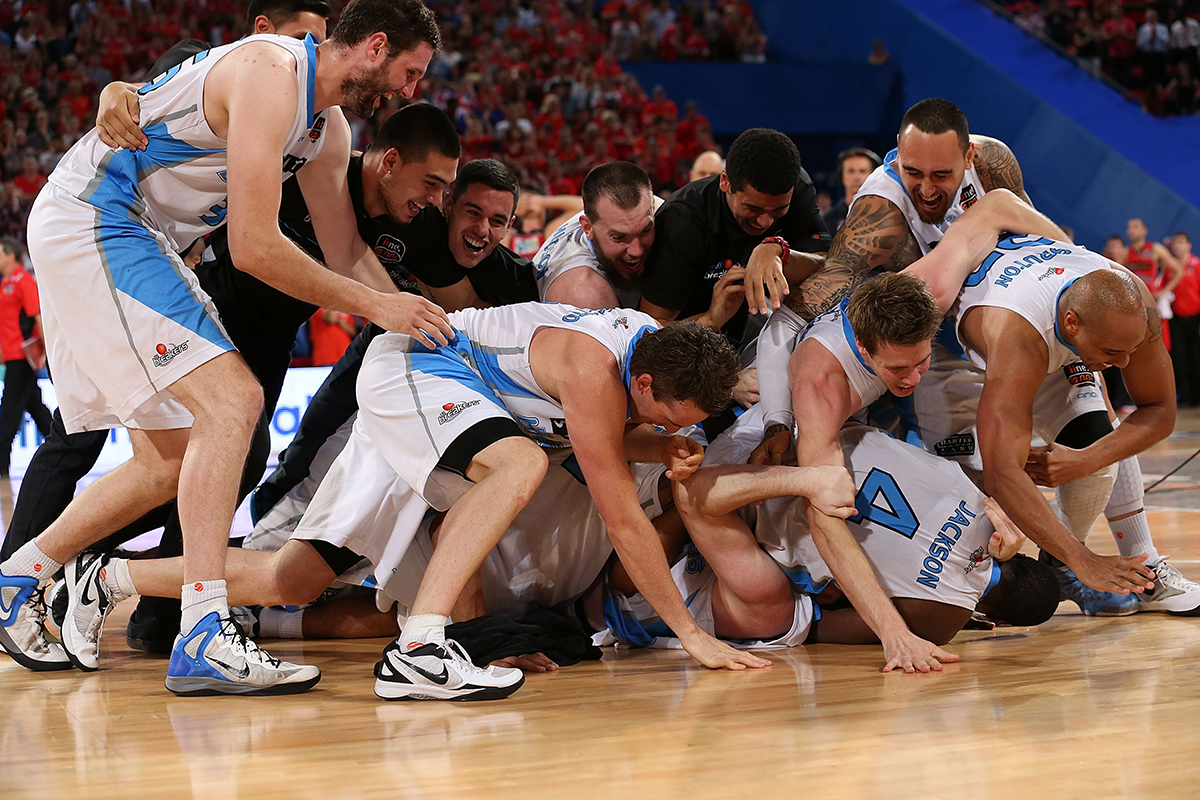 The Breakers celebrate on the court after winning the NBL Championship during game two of the NBL Grand Final series between the Perth Wildcats and the New Zealand Breakers at Perth Arena