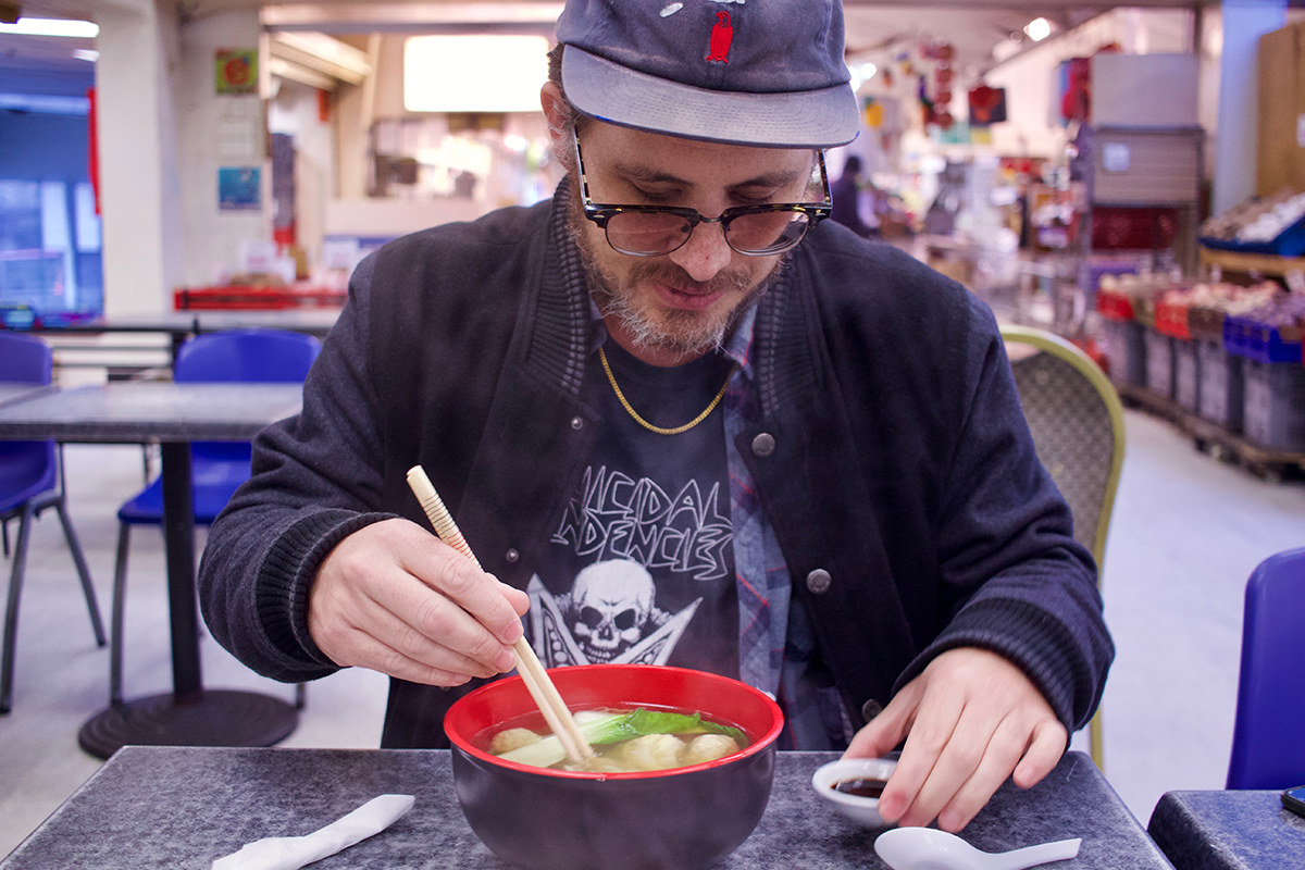 Ross Liew and a bowl of wonton noodle soup from Mercury Plaza's Chinese Cuisine.