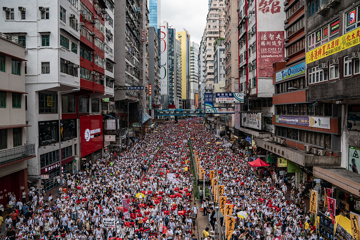 Hong Kongers Protest Over China Extradition Law Sea of people protesting on HK street